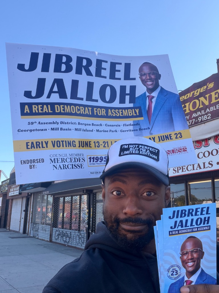 Julius Stukes Jr. on the campaign trail with Jibreel Jalloh billboards